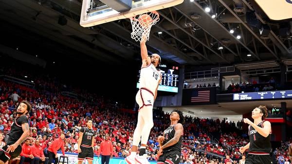 Dayton gets big games from both Elvis, Holmes, as they beat Troy