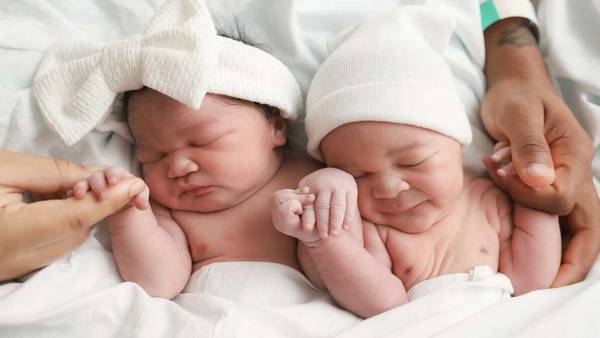 Twins born minutes apart, but in different years